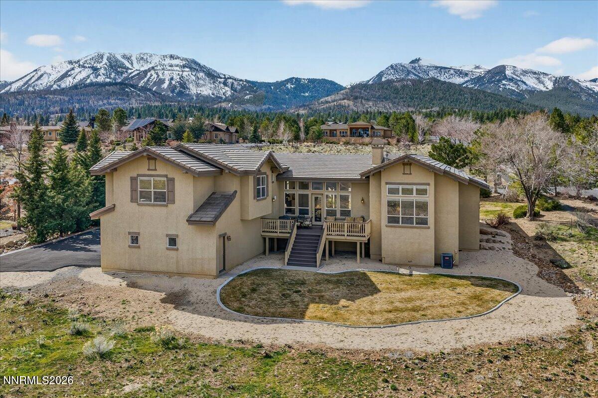 224 South Earlham Court Reno, NV 89511 - Photo 19 of 54 a view of a house with a yard and roof