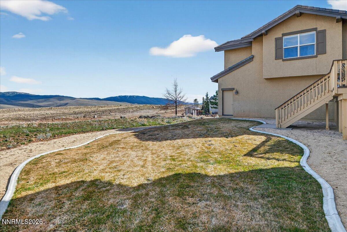 224 South Earlham Court Reno, NV 89511 - Photo 20 of 54 a view of a house with a yard