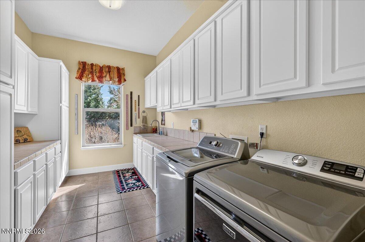 224 South Earlham Court Reno, NV 89511 - Photo 24 of 54 a kitchen with a stove and a sink