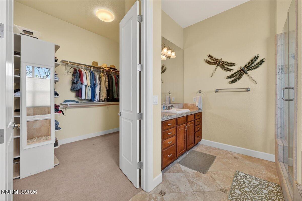 224 South Earlham Court Reno, NV 89511 - Photo 30 of 54 a view of walk in closet and bedroom