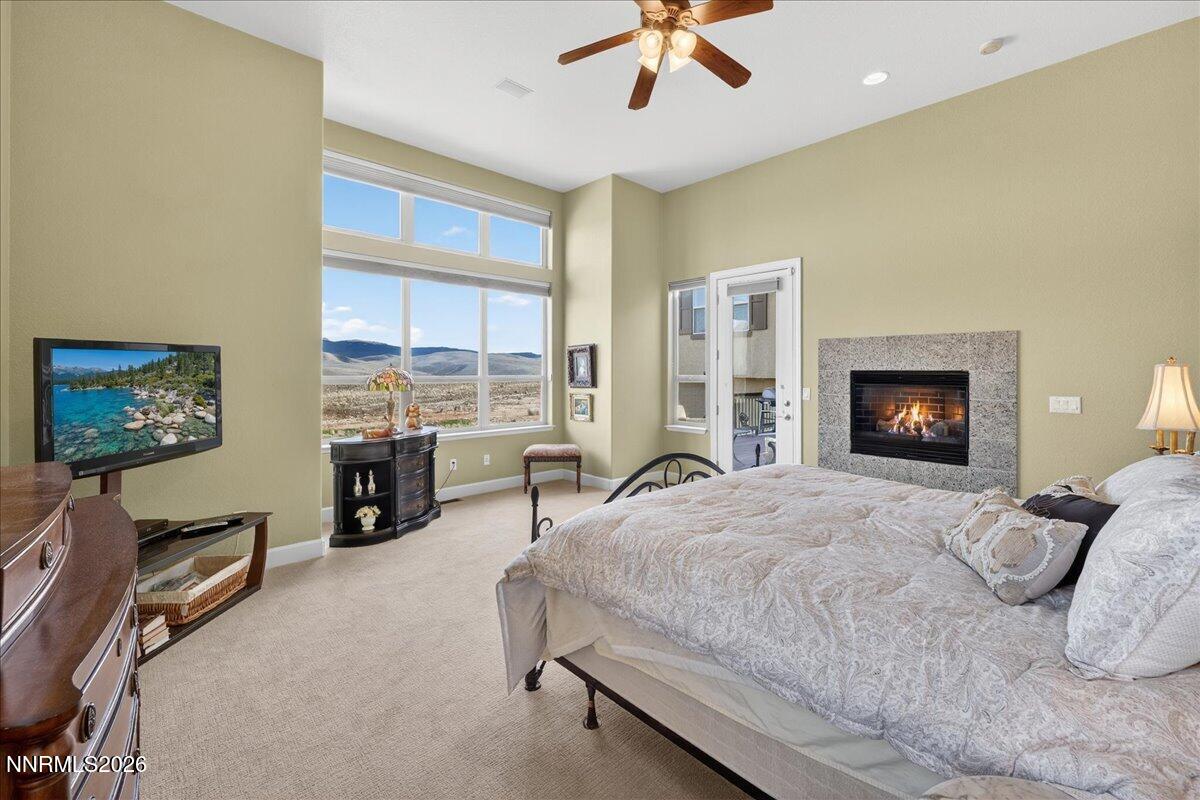 224 South Earlham Court Reno, NV 89511 - Photo 32 of 54 a bedroom with a bed furniture and a flat screen tv