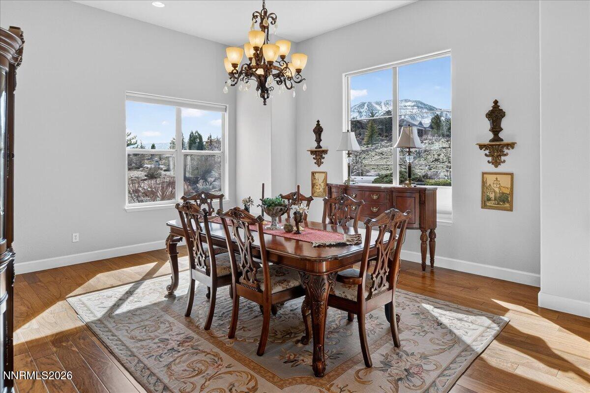 224 South Earlham Court Reno, NV 89511 - Photo 34 of 54 a view of a dining room with furniture window and wooden floor