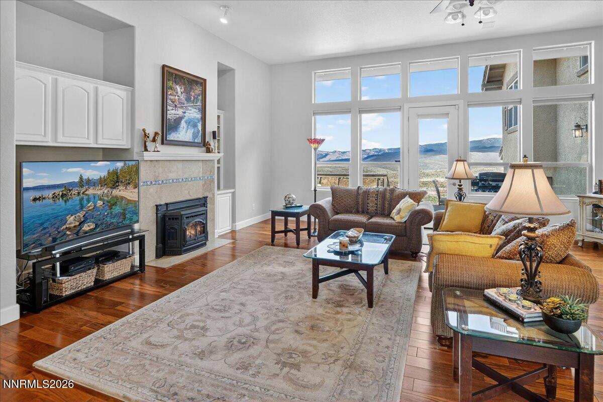 224 South Earlham Court Reno, NV 89511 - Photo 42 of 54 a living room with furniture and a fireplace
