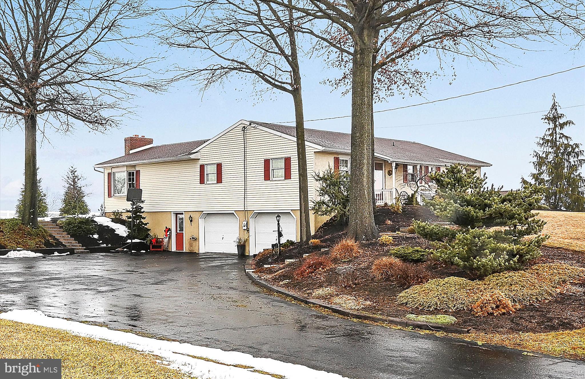 61 West Rosebud Road Myerstown, PA 17067 - Photo 14 of 58 a view of a white house with a large tree