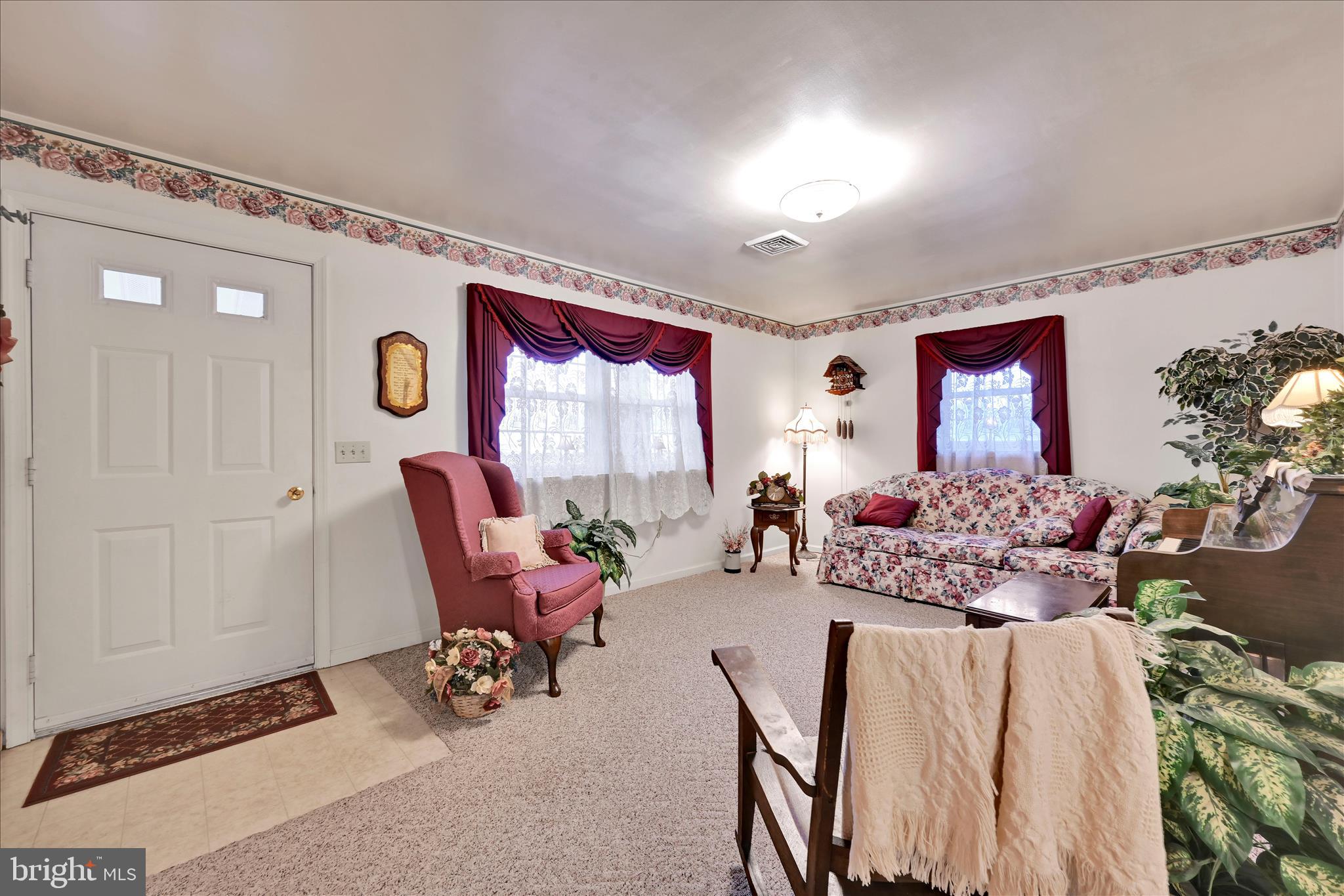 61 West Rosebud Road Myerstown, PA 17067 - Photo 16 of 58 a living room with furniture and flowers