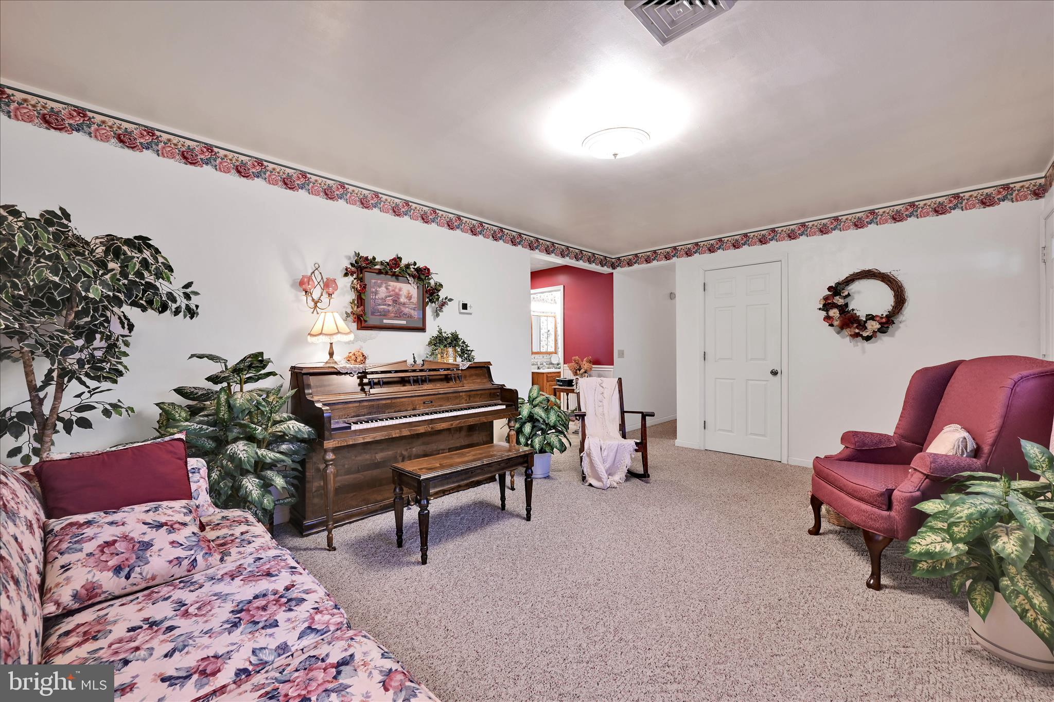 61 West Rosebud Road Myerstown, PA 17067 - Photo 17 of 58 a bedroom with furniture and a rug