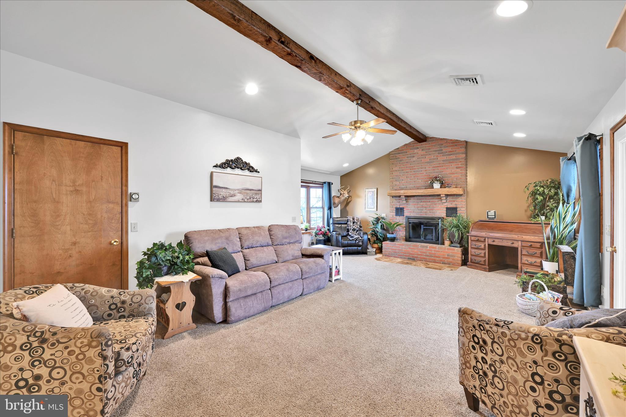 61 West Rosebud Road Myerstown, PA 17067 - Photo 22 of 58 a living room with furniture and a fireplace