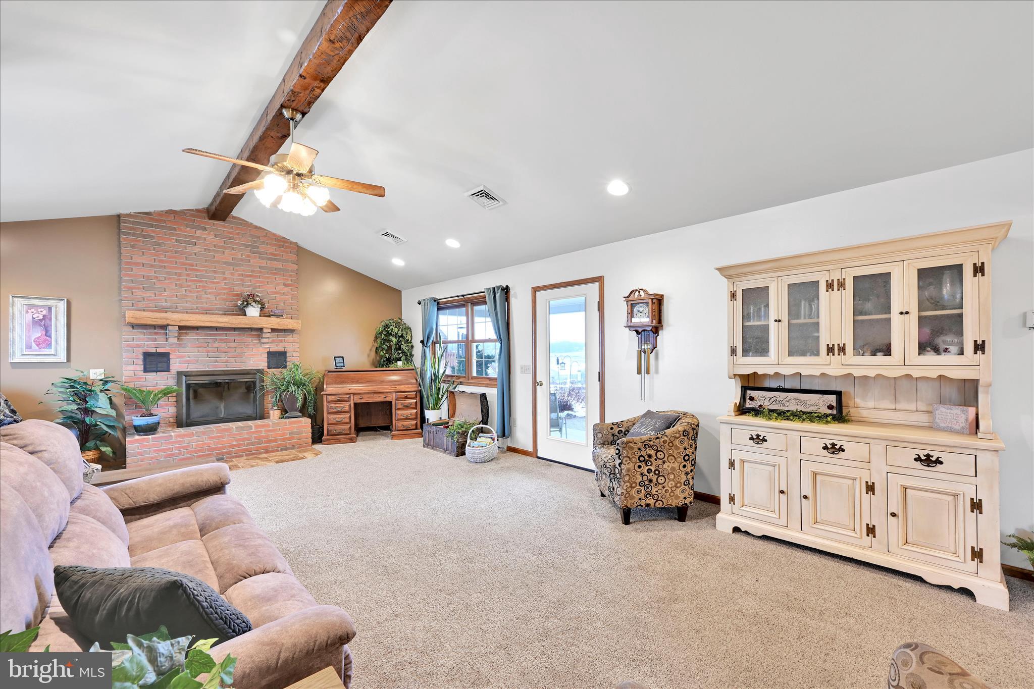 61 West Rosebud Road Myerstown, PA 17067 - Photo 23 of 58 a living room with furniture cabinets and a flat screen tv