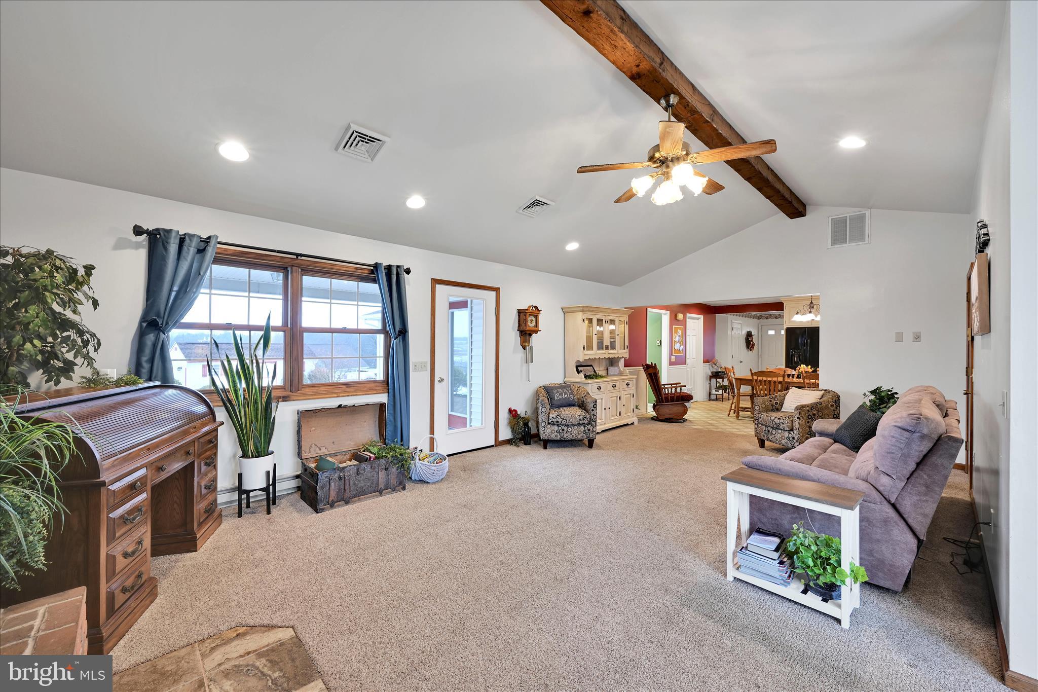 61 West Rosebud Road Myerstown, PA 17067 - Photo 24 of 58 a living room with furniture ceiling fan and a large window