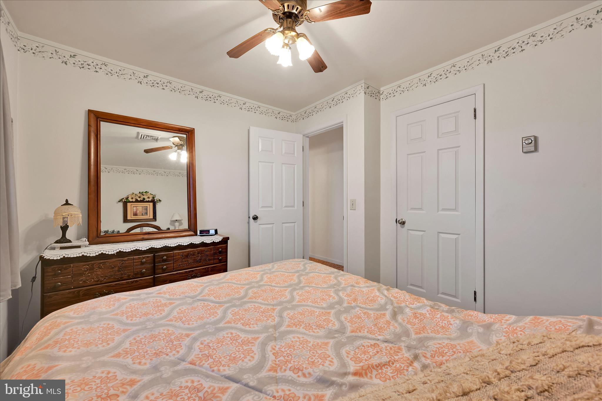 61 West Rosebud Road Myerstown, PA 17067 - Photo 27 of 58 a bedroom with a bed and a dresser