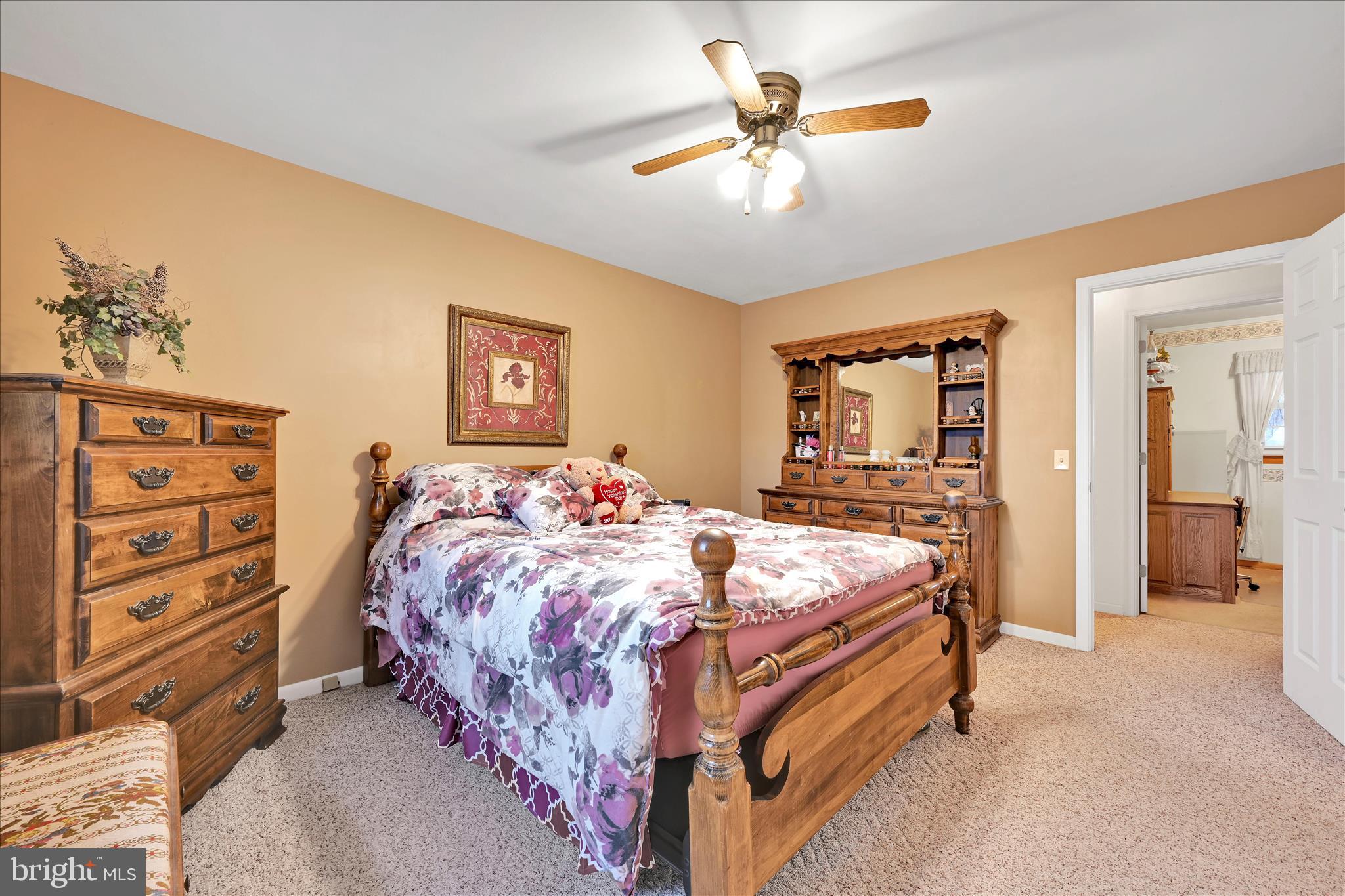 61 West Rosebud Road Myerstown, PA 17067 - Photo 33 of 58 a bed sitting in a bedroom and a table