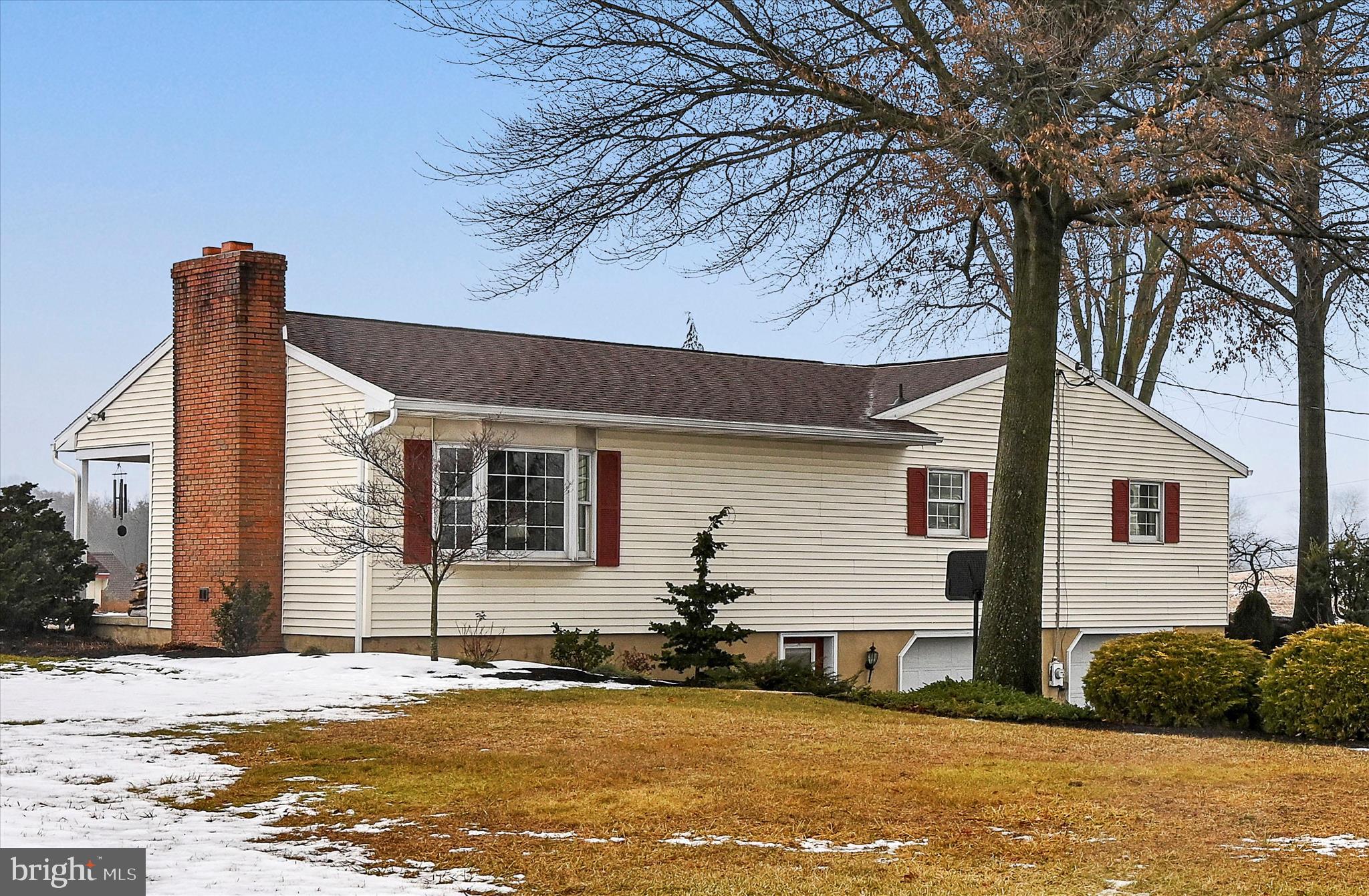 61 West Rosebud Road Myerstown, PA 17067 - Photo 46 of 58 a front view of a house with a yard and garage