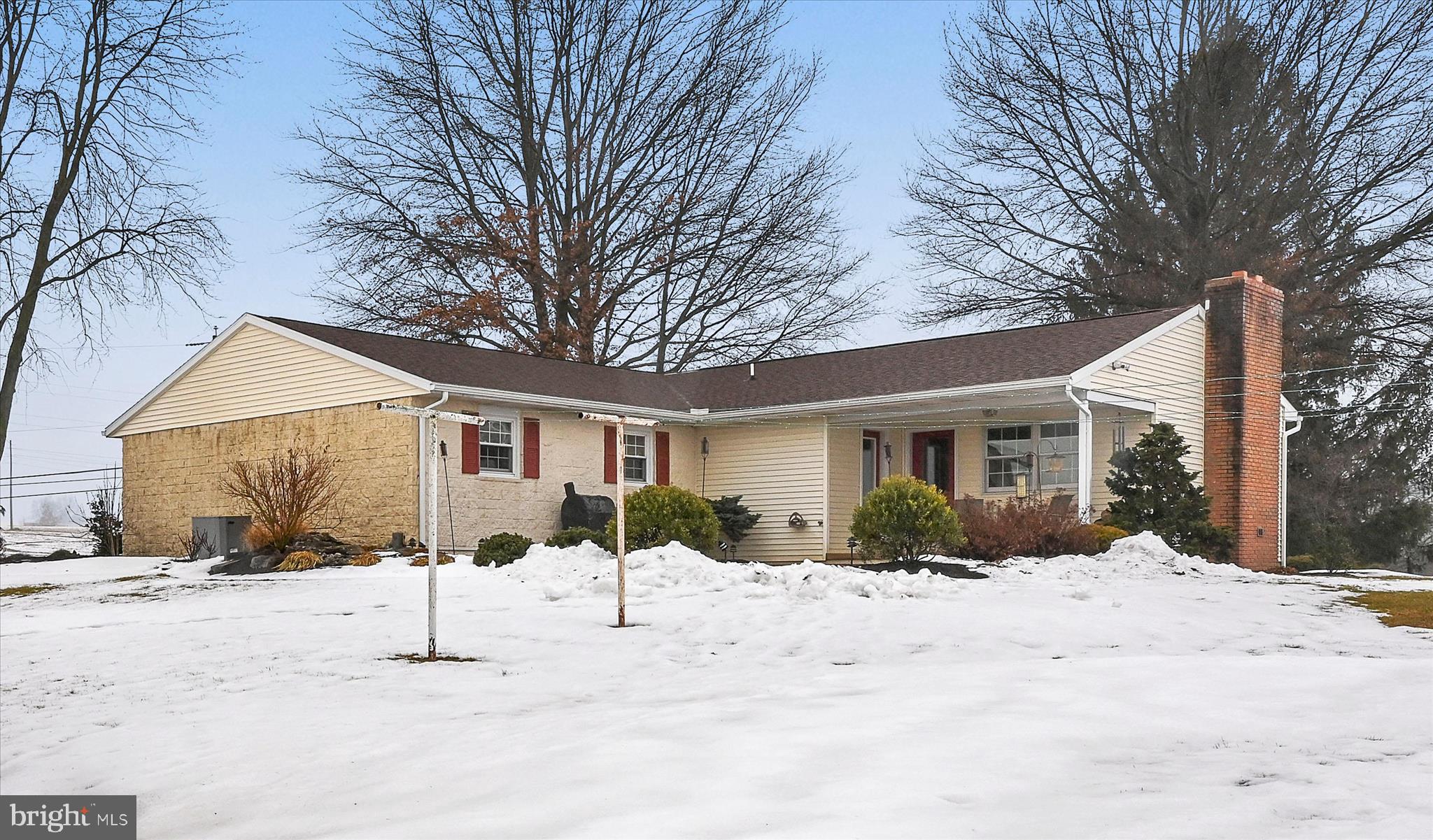 61 West Rosebud Road Myerstown, PA 17067 - Photo 49 of 58 a front of a house with a yard covered in snow
