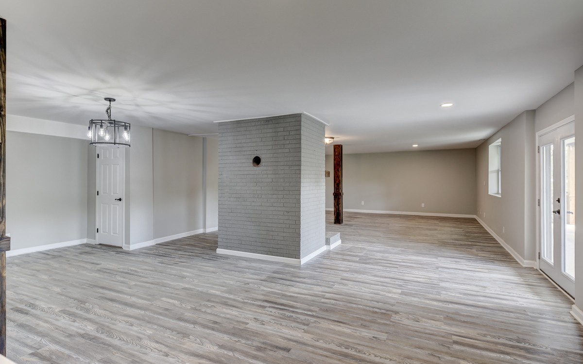401 S Road Cottontown, TN 37048 - Photo 11 of 50 wooden floor in an empty room with a window