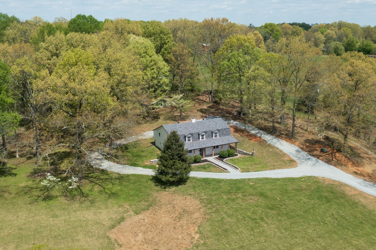 401 S Road Cottontown, TN 37048 - Photo 3 of 50 an aerial view of a house with a yard