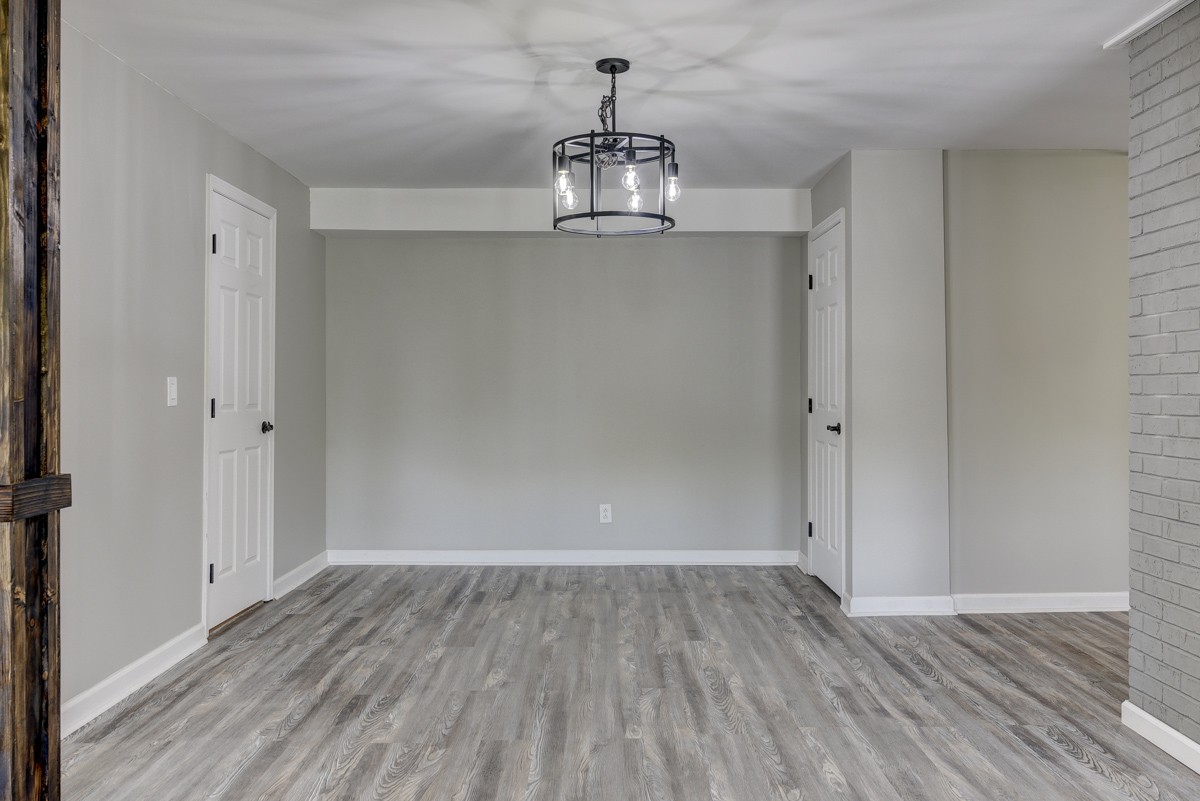401 S Road Cottontown, TN 37048 - Photo 25 of 50 wooden floor in an empty room with a window