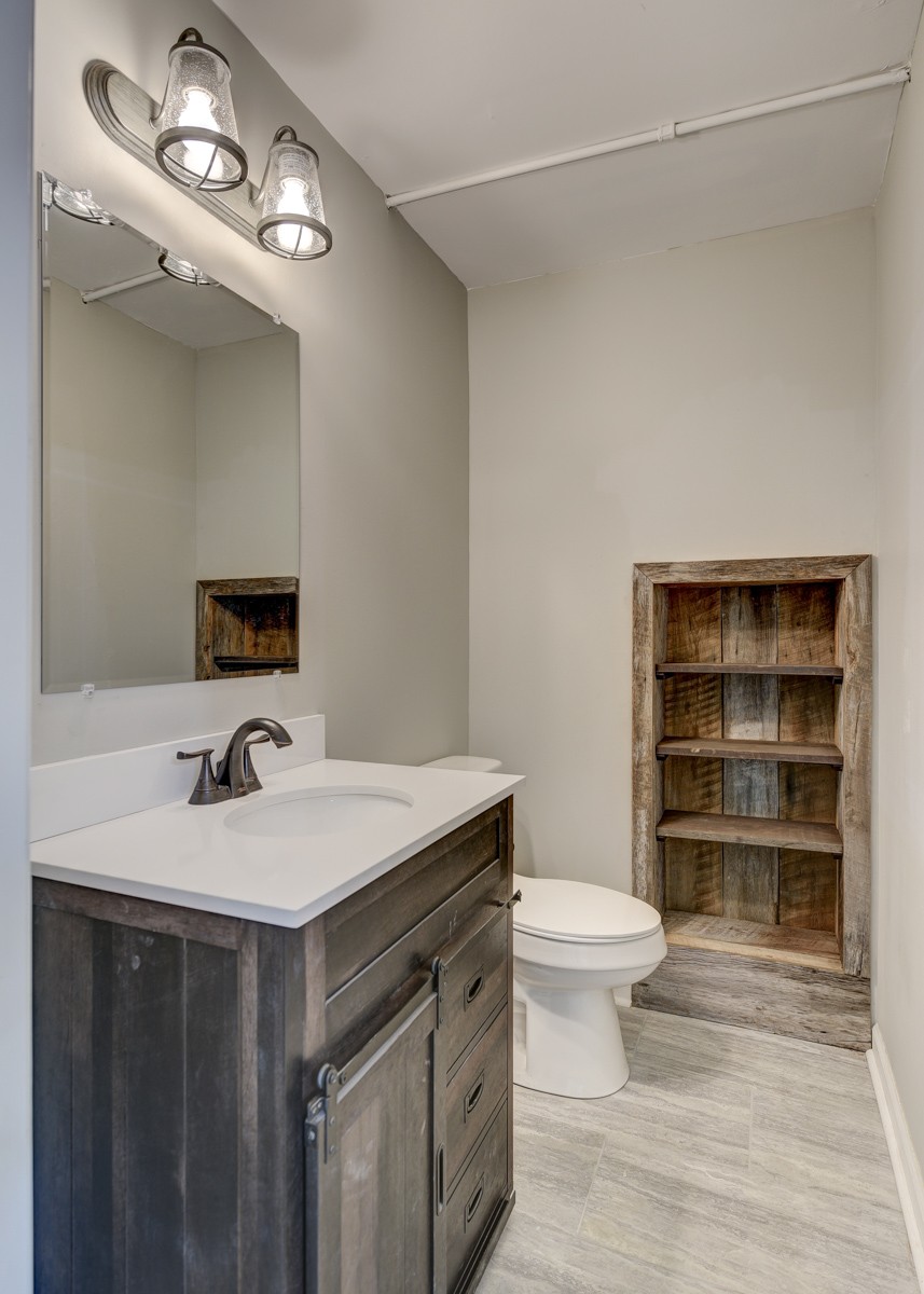 401 S Road Cottontown, TN 37048 - Photo 29 of 50 a bathroom with a sink vanity and toilet