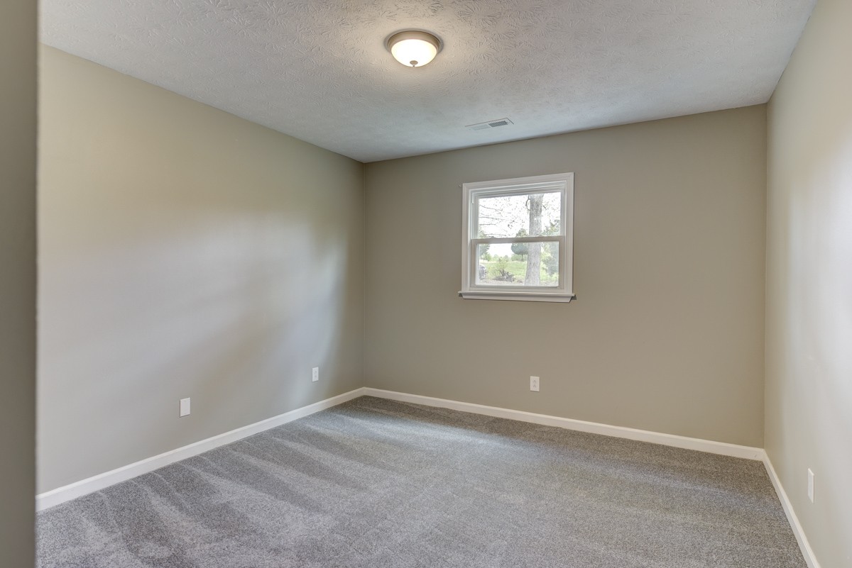 401 S Road Cottontown, TN 37048 - Photo 44 of 50 an empty room with a window