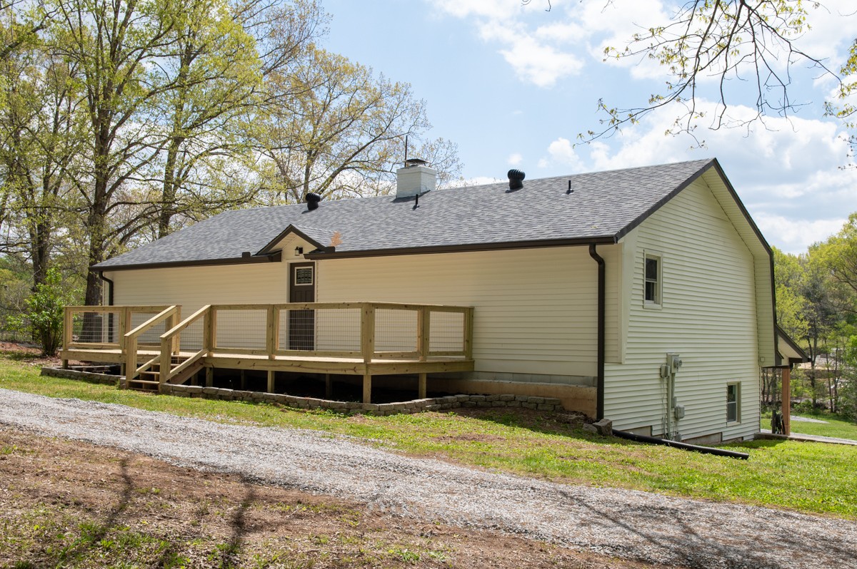 401 S Road Cottontown, TN 37048 - Photo 45 of 50 a view of a house with a yard and large tree