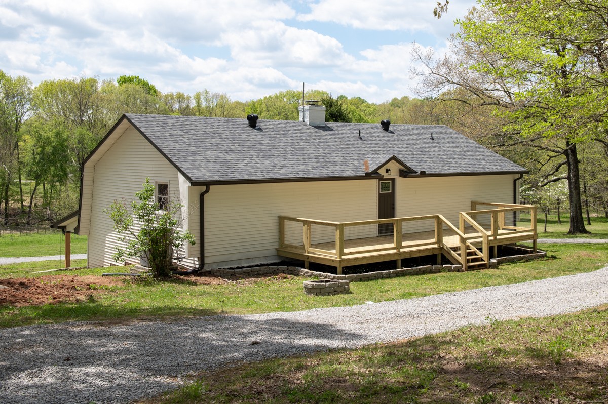 401 S Road Cottontown, TN 37048 - Photo 46 of 50 a view of a house with a yard and sitting area