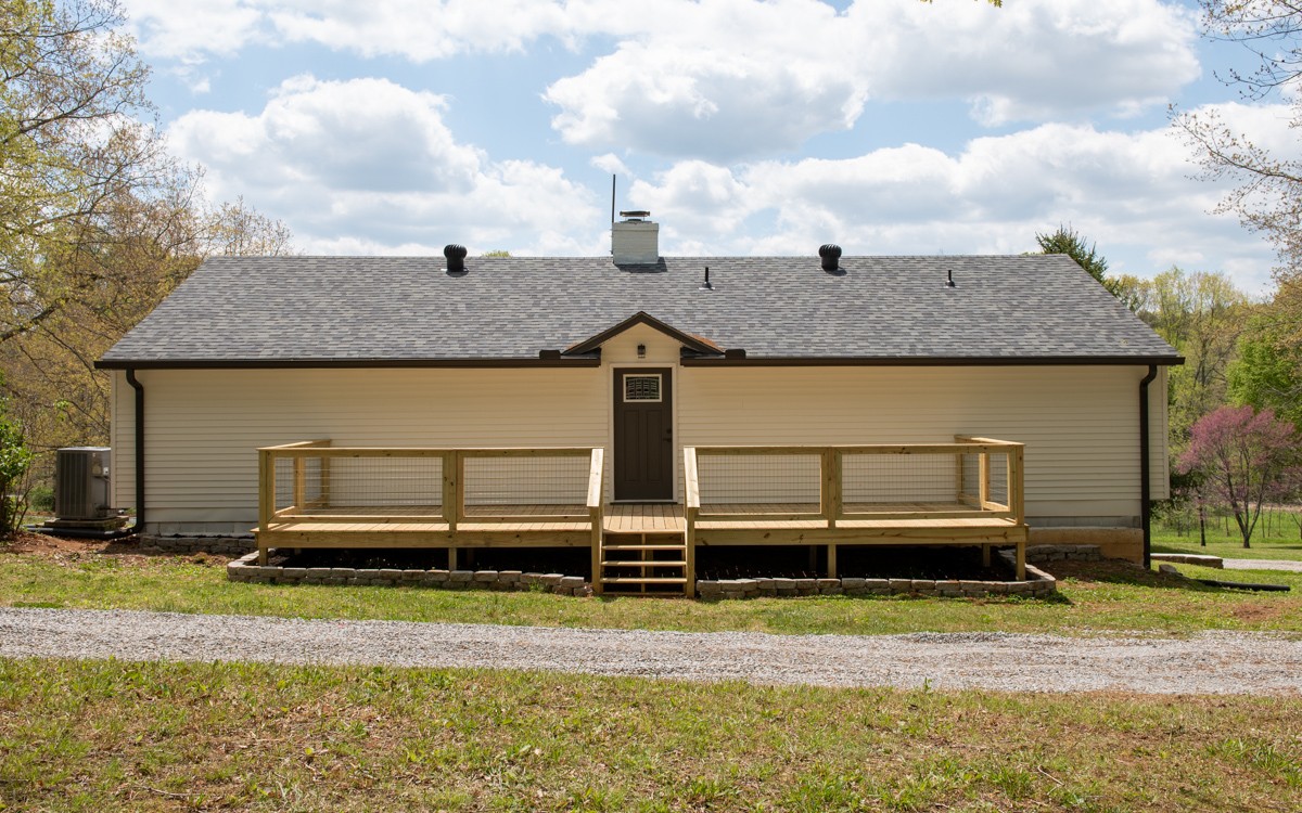 401 S Road Cottontown, TN 37048 - Photo 48 of 50 a view of a house with a backyard