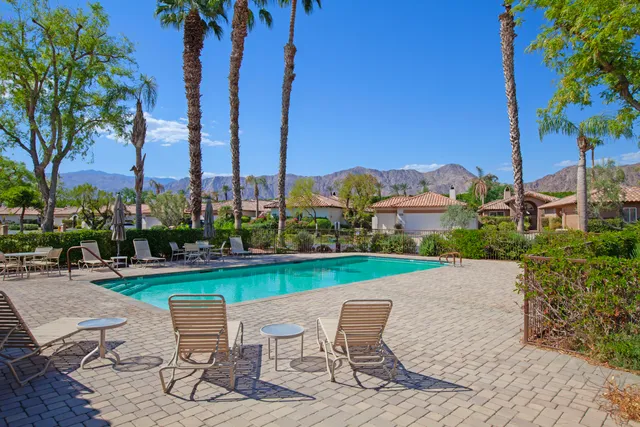 a view of a table and chairs in patio