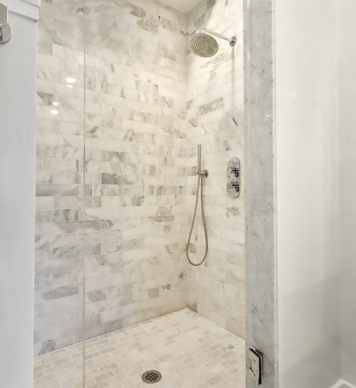 189 Babcock Street, Unit 2 Brookline, MA 02446 - Photo 25 of 39 a bathroom with a shower