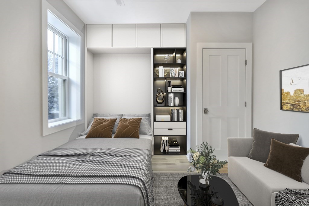 189 Babcock Street, Unit 2 Brookline, MA 02446 - Photo 32 of 39 a bedroom with a bed furniture and a window