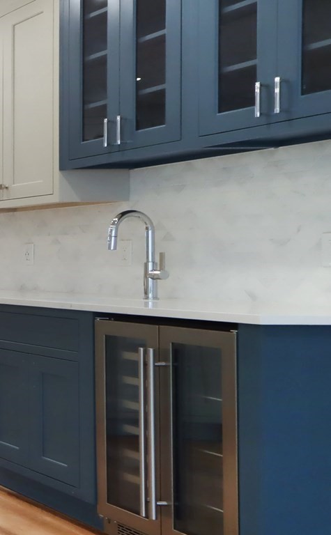 189 Babcock Street, Unit 2 Brookline, MA 02446 - Photo 10 of 39 a kitchen with a sink and cabinets