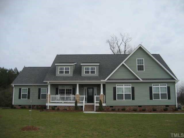 665 Cole Road Clayton, NC 27520 - Photo 1 of 12 Beautiful Immaculate Systems Built Home 2600sf down & 1675sf unfinished up on 1.86ac unrestricted lot in a country setting with a wooded private back yard.
