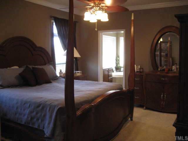 665 Cole Road Clayton, NC 27520 - Photo 8 of 12 Master bedroom with crown molding.