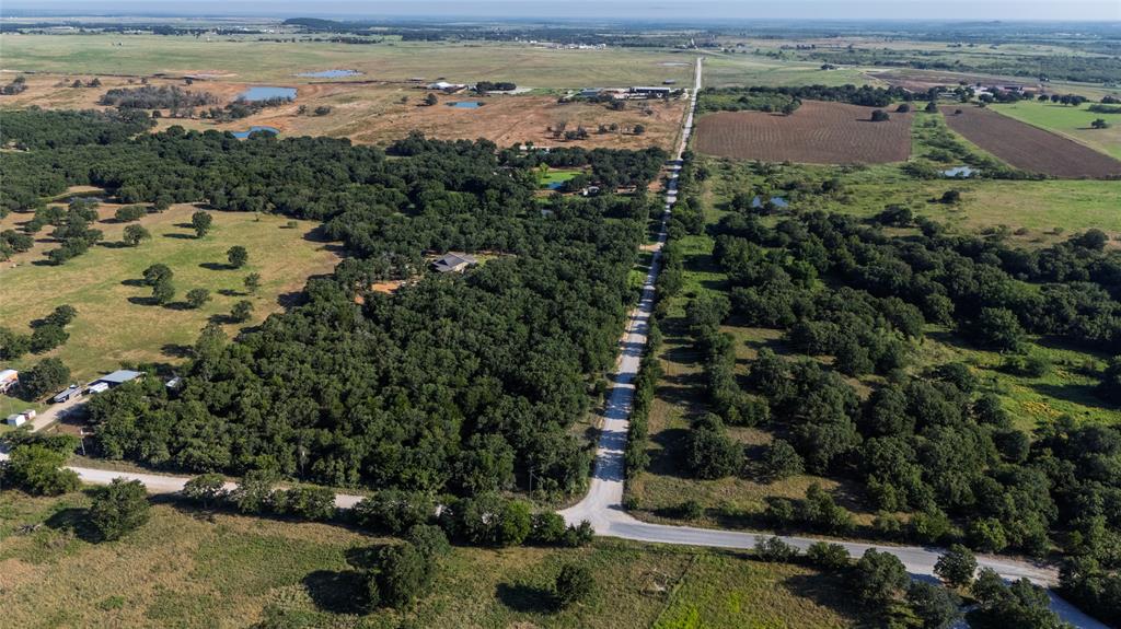 Tbd Old Vashti Road Bowie, TX 76230 - Photo 20 of 36 an aerial view of a houses with a lake view