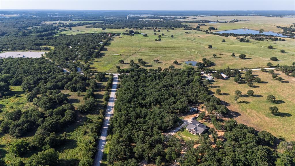 Tbd Old Vashti Road Bowie, TX 76230 - Photo 21 of 36 an aerial view of a houses with a yard and lake view