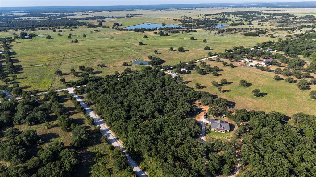 Tbd Old Vashti Road Bowie, TX 76230 - Photo 22 of 36 an aerial view of a houses with a lake