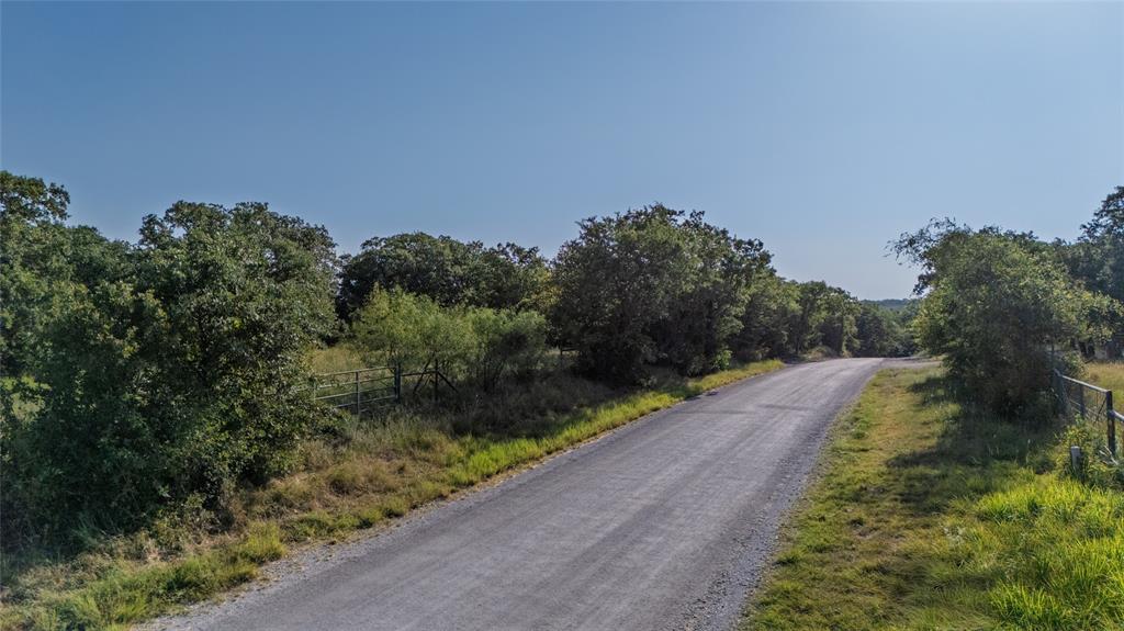 Tbd Old Vashti Road Bowie, TX 76230 - Photo 26 of 36 a view of a pathway both side of grassy field with trees