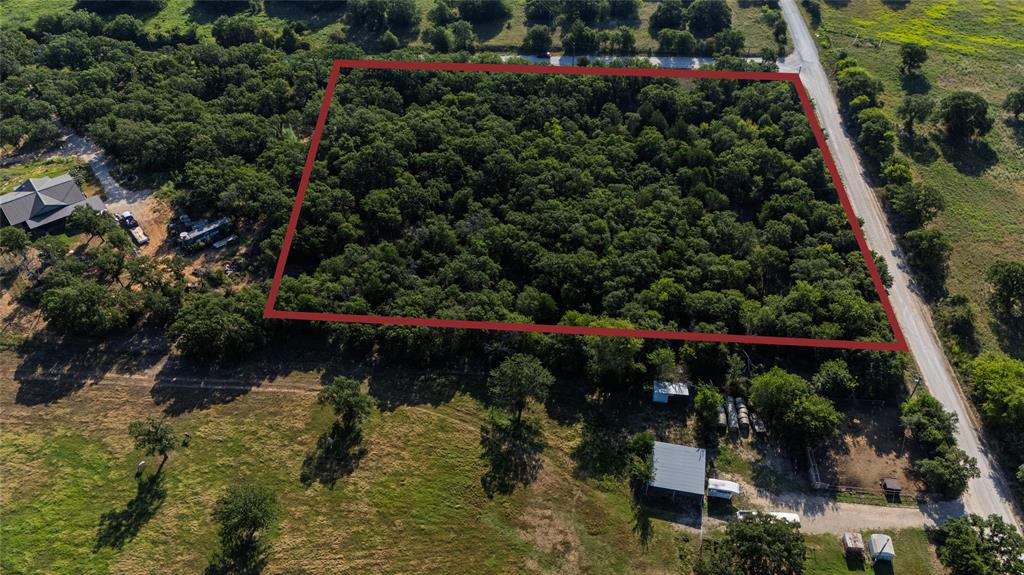 Tbd Old Vashti Road Bowie, TX 76230 - Photo 3 of 36 an aerial view of residential house with outdoor space and swimming pool