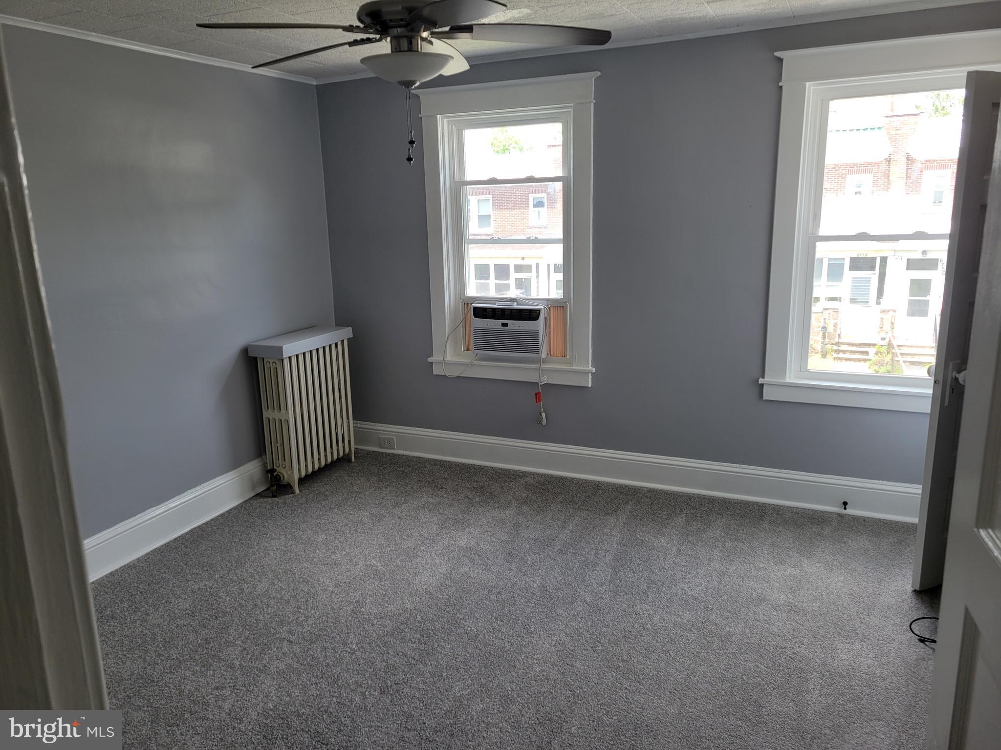 6757 Woodley Road Dundalk, MD 21222 - Photo 18 of 27 an empty room with a window