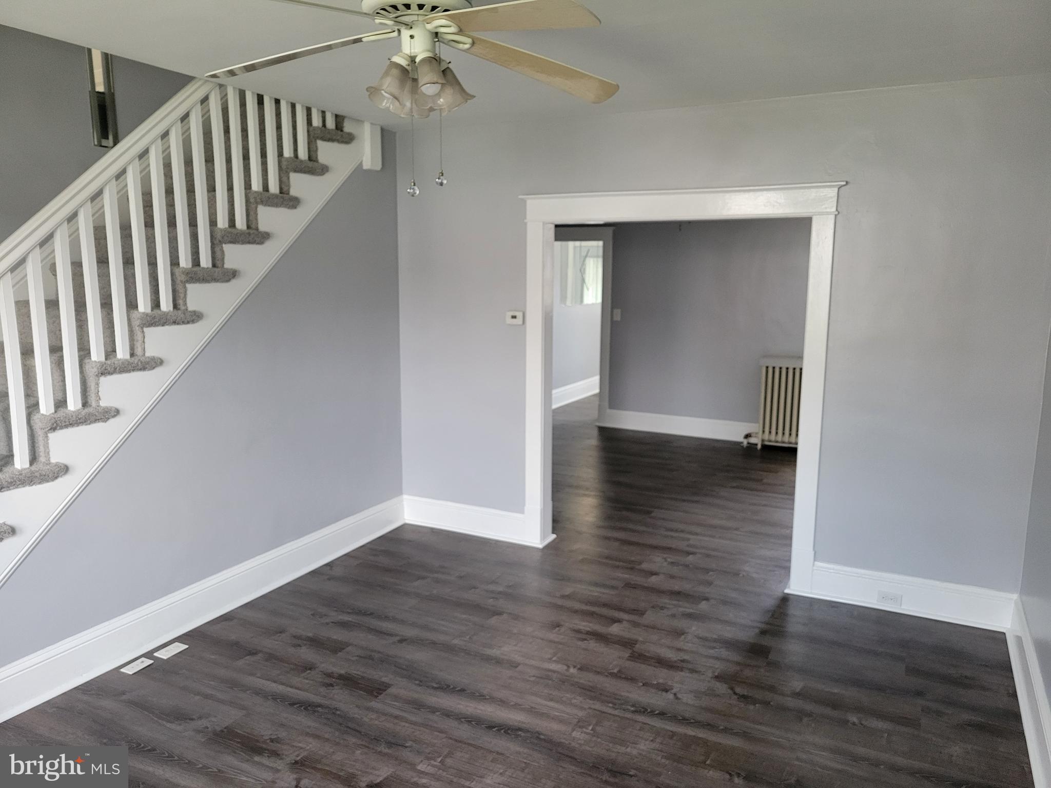 6757 Woodley Road Dundalk, MD 21222 - Photo 8 of 27 a view of an entryway with wooden floor