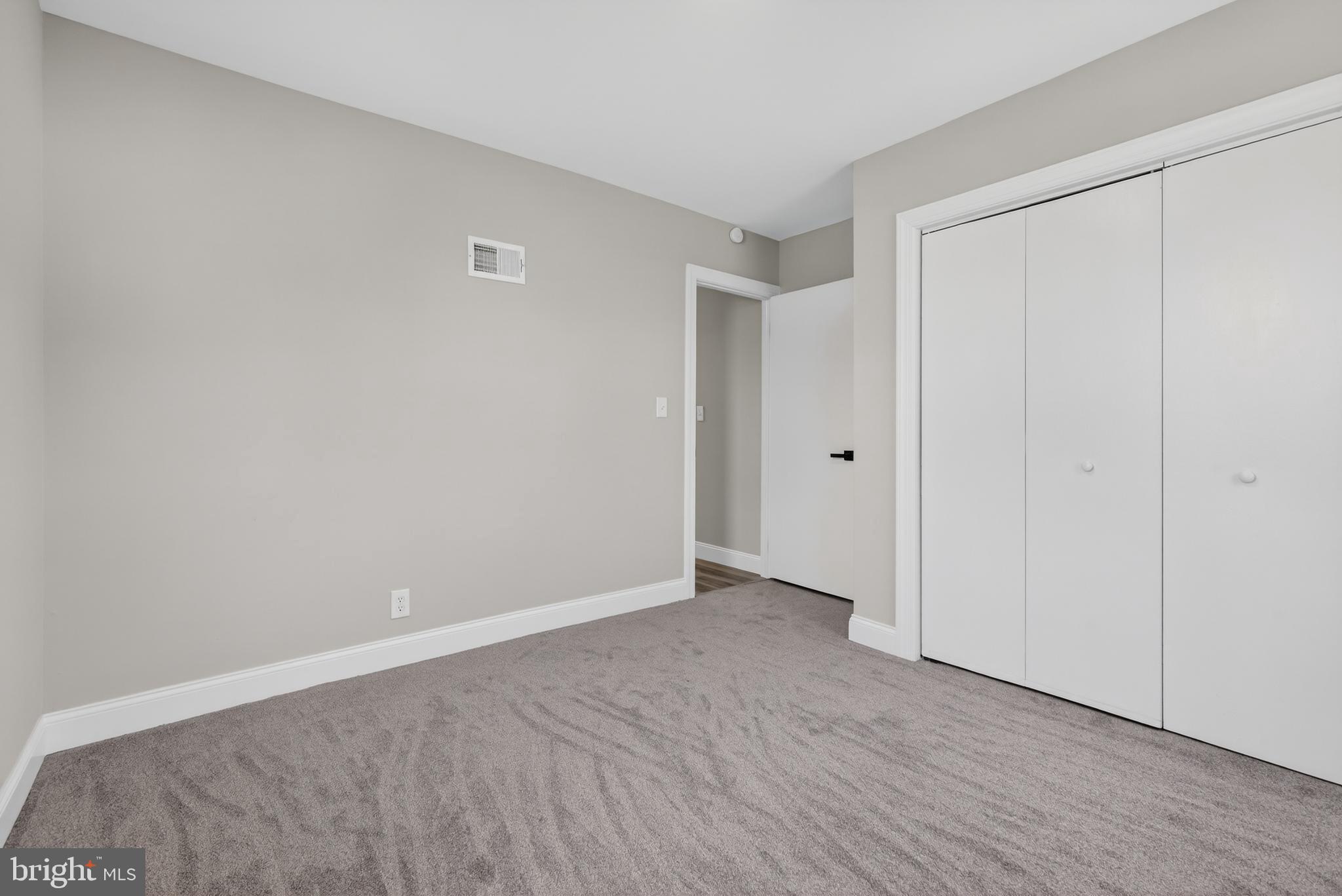 5960 Clover Road Harrisburg, PA 17112 - Photo 17 of 39 a view of an empty room with wooden floor