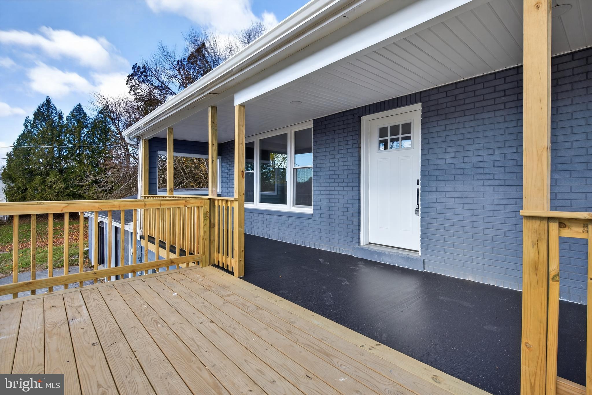 5960 Clover Road Harrisburg, PA 17112 - Photo 2 of 39 a view of a house with wooden deck