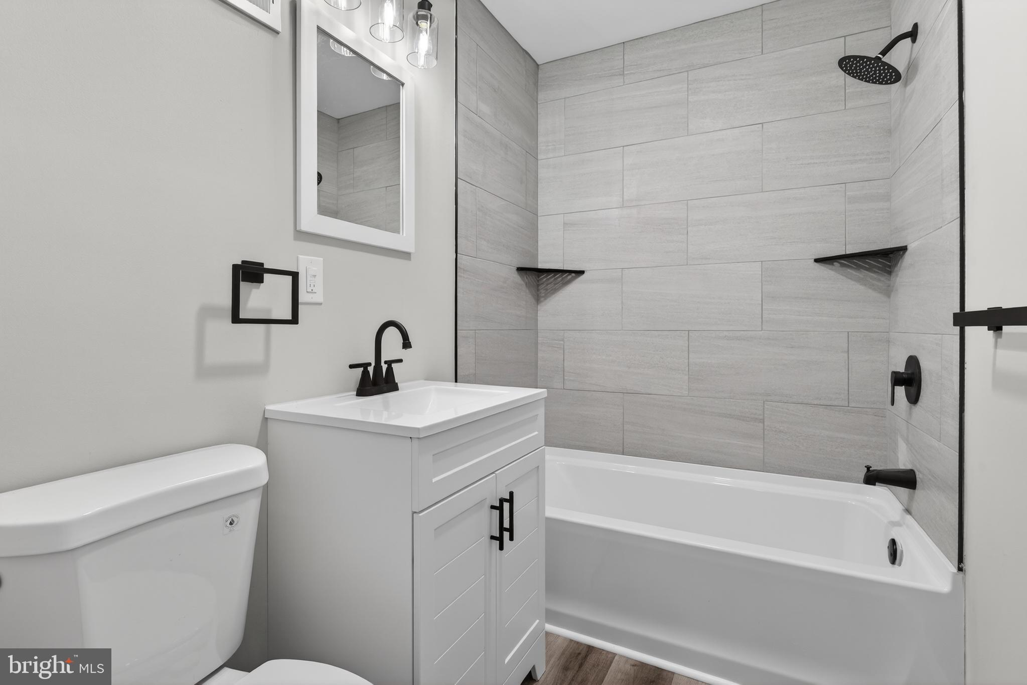 5960 Clover Road Harrisburg, PA 17112 - Photo 22 of 39 a bathroom with a sink toilet and bathtub