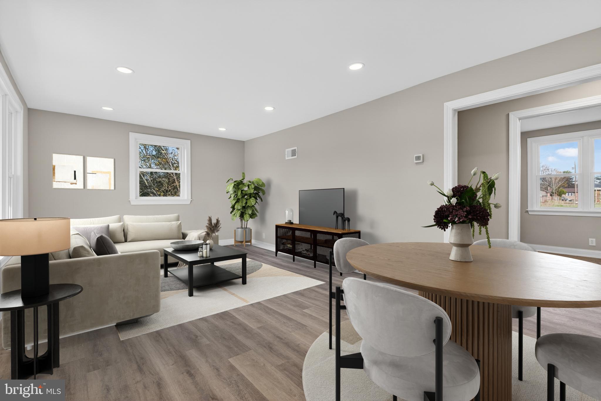 5960 Clover Road Harrisburg, PA 17112 - Photo 3 of 39 a living room with furniture potted plant and wooden floor