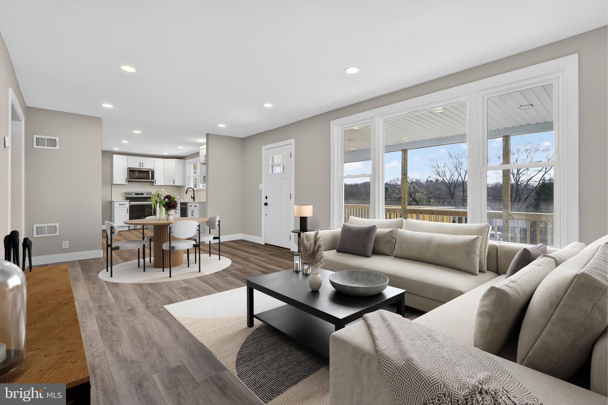 5960 Clover Road Harrisburg, PA 17112 - Photo 4 of 39 a living room with furniture and a large window