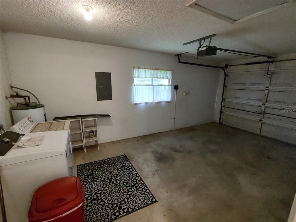 6345 Southwest 115th Street Road Ocala, FL 34476 - Photo 10 of 10 a room with furniture and a rug