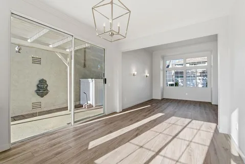 a view of entryway with wooden floor