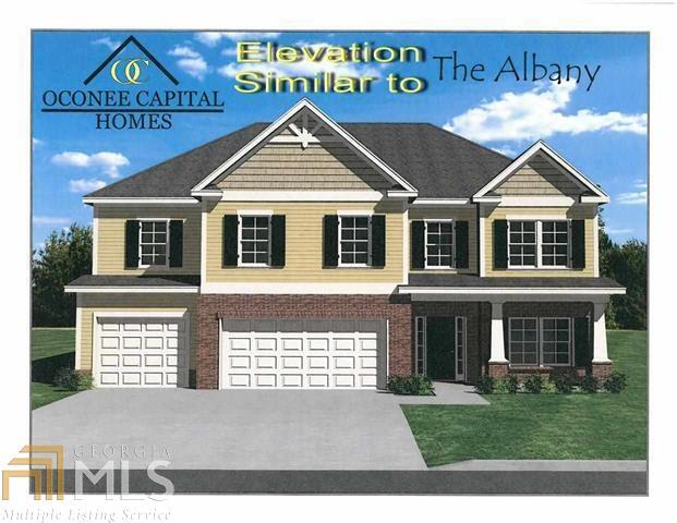 205 Ousley Way Perry, GA 31069 - Photo 1 of 1 a front view of a house with garden