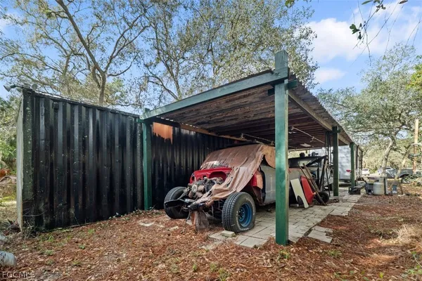 a view of outdoor space with deck and entertaining space