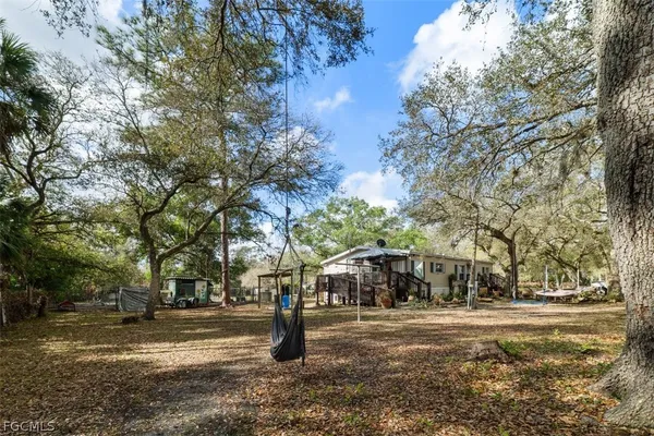 a view of a park with trees