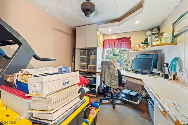 a room with furniture and a flat screen tv