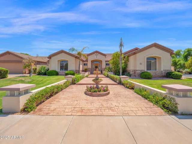 a house view with a garden space